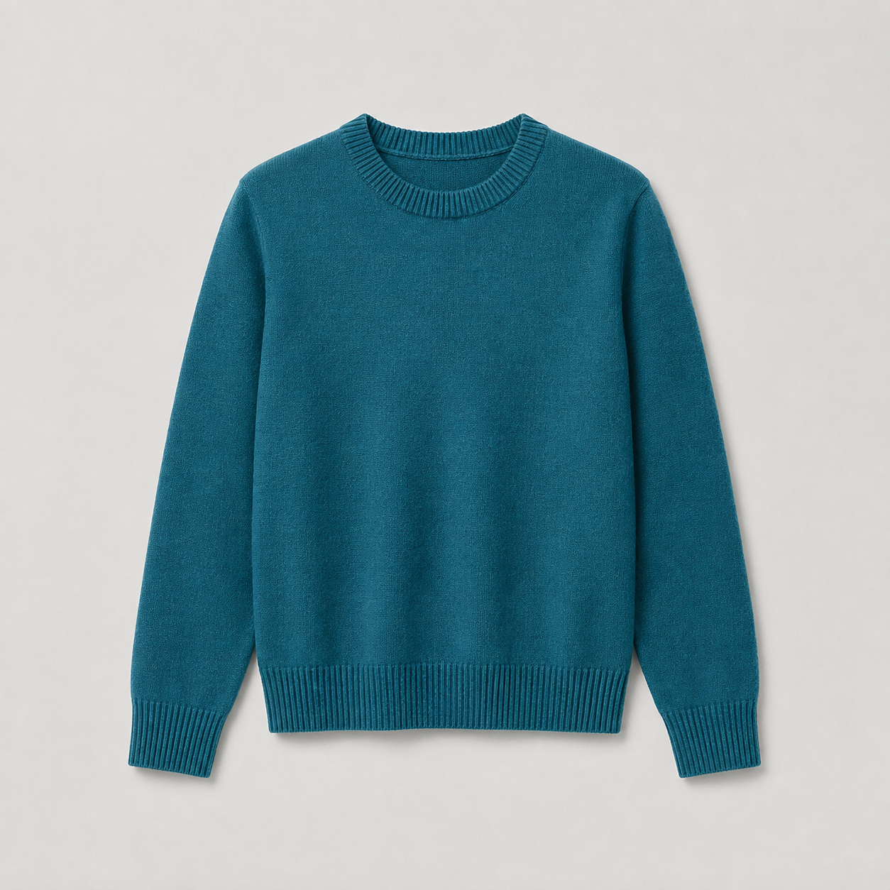 A teal blue crewneck knit sweater with ribbed collar, cuffs, and hem, displayed flat against a light gray background.